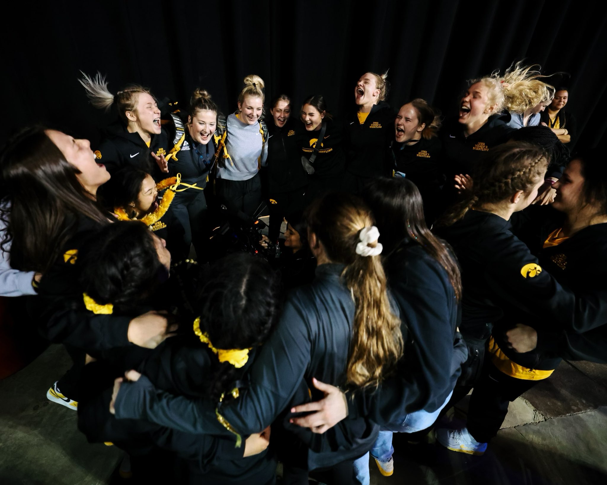 women wrestlers celebrate