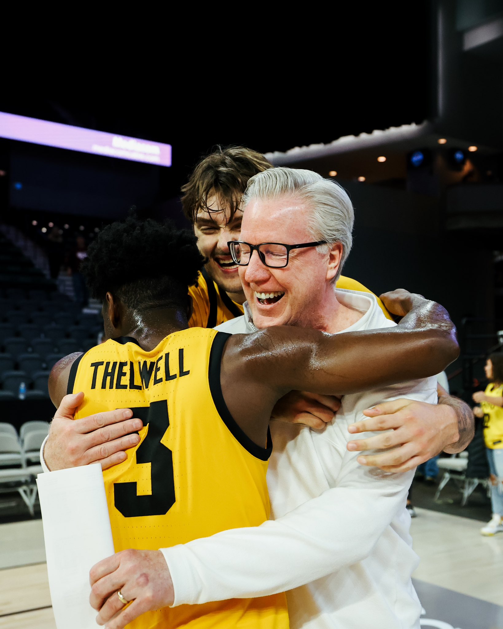 Fran McCaffery, Owen Freeman and Drew Thelwell hug after win Fran McCaffery, Owen Freeman and Drew Thelwell hug after win