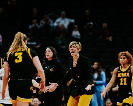 Jan Jensen and Hawkeye players vs Michigan State